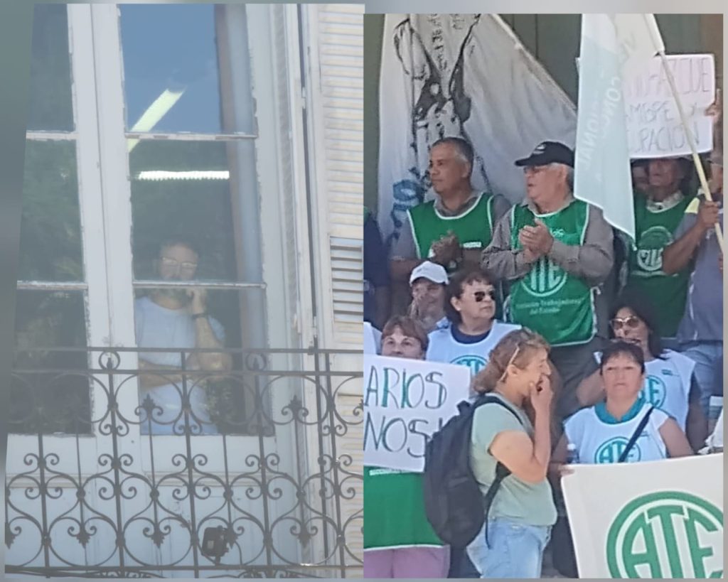 Intendente Azcué mira a trabajadores que exigen salarios dignos desde la ventana